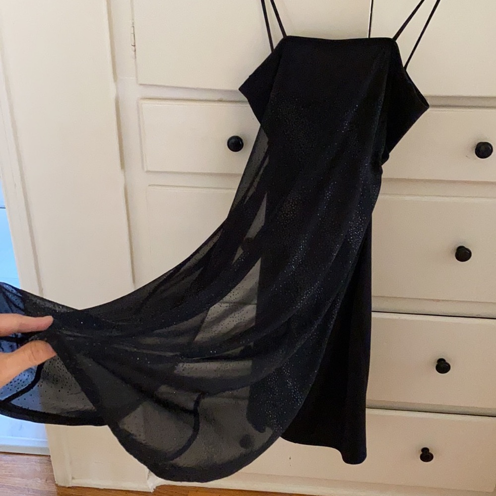 Little black dress with sheer glitter train